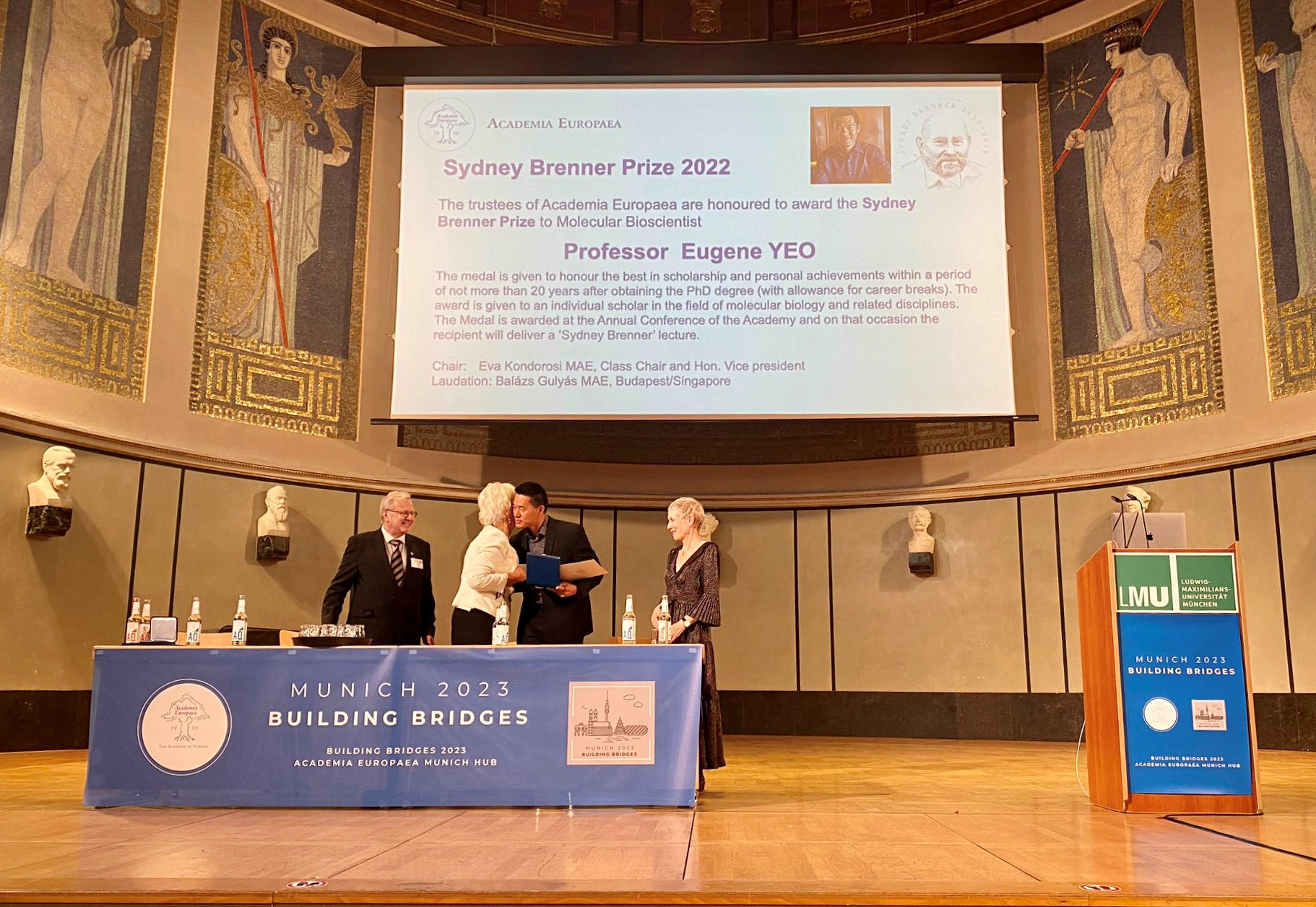 Professor Kondorosi congratulates Professor Yeo